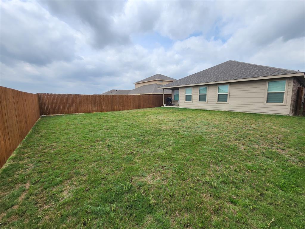 9240 Castorian Drive Fort Worth, TX 76131 - Photo 38 of 40 a view of a yard in front of a house