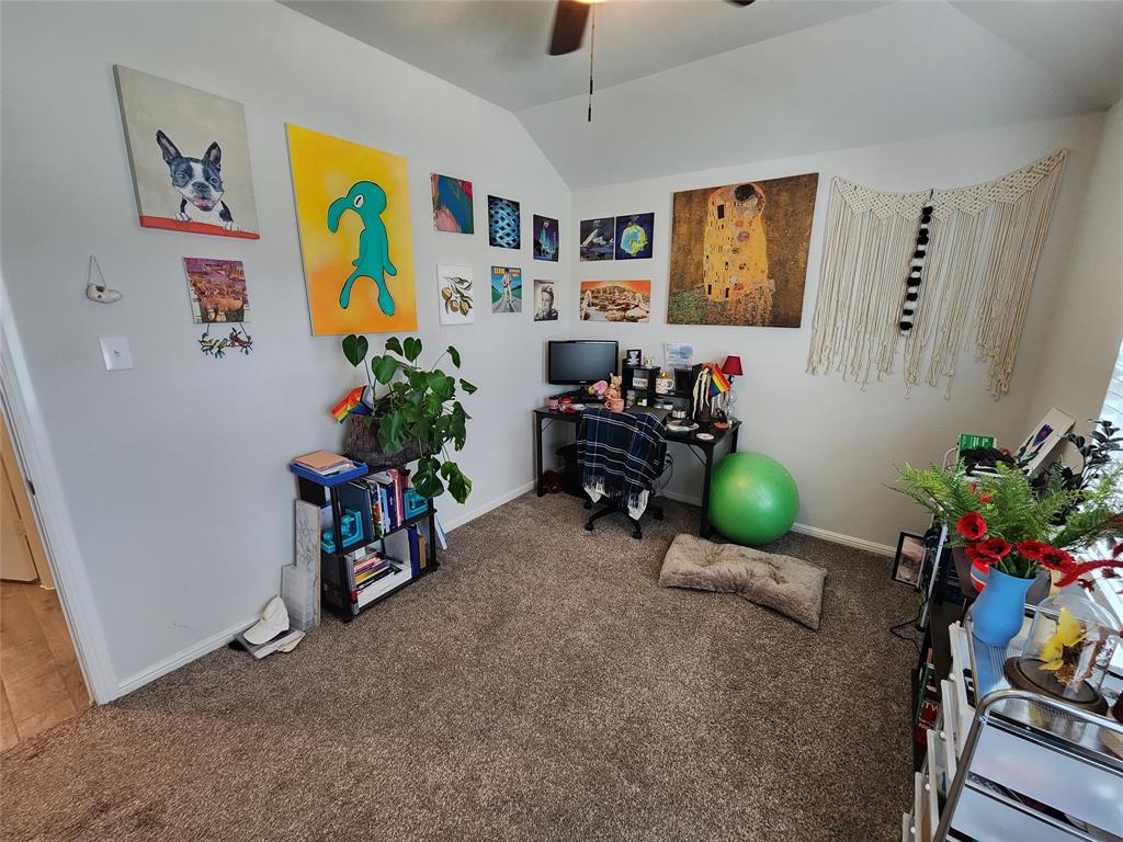 9240 Castorian Drive Fort Worth, TX 76131 - Photo 5 of 40 a room with painting on the wall and a window