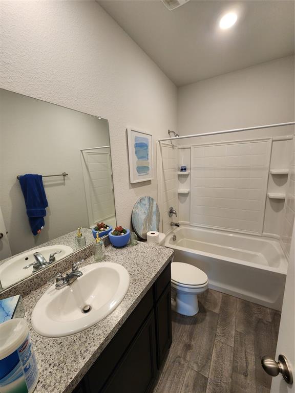 9240 Castorian Drive Fort Worth, TX 76131 - Photo 9 of 40 a bathroom with a granite countertop sink toilet and shower