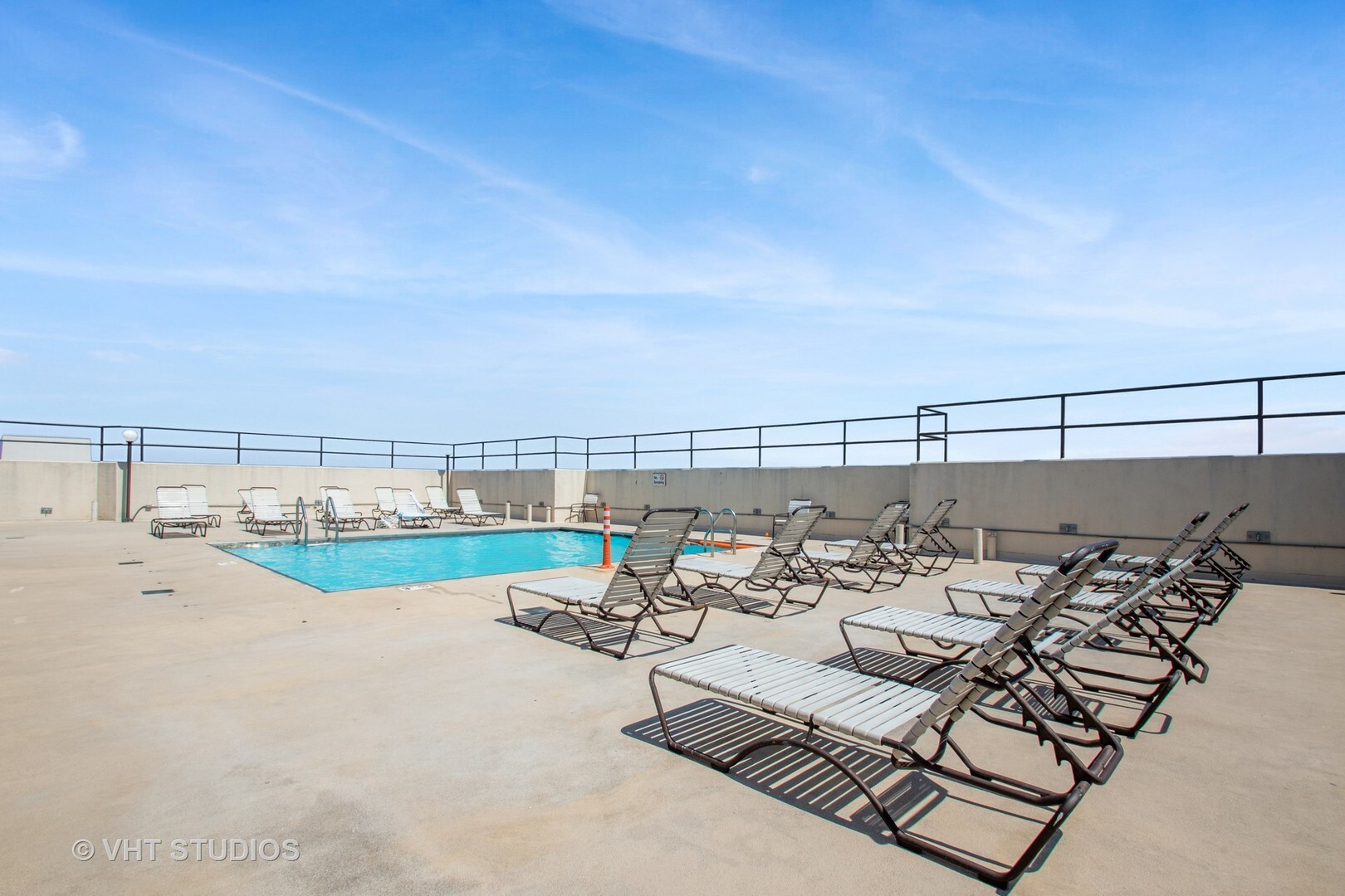 3150 North Sheridan Road, Unit 25CD Chicago, IL 60657 - Photo 21 of 28 an outdoor sitting area with furniture