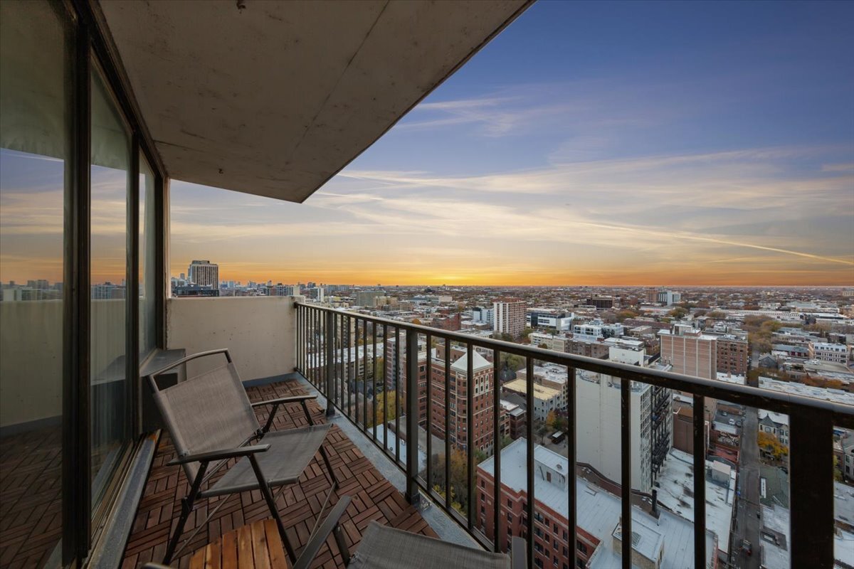3150 North Sheridan Road, Unit 25CD Chicago, IL 60657 - Photo 3 of 28 a view of a balcony with an ocean view