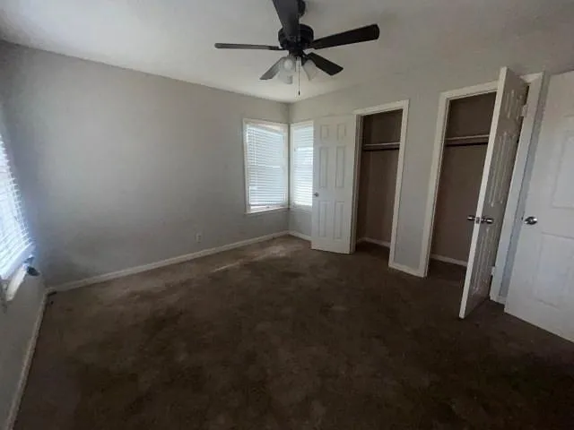 a view of empty room with windows