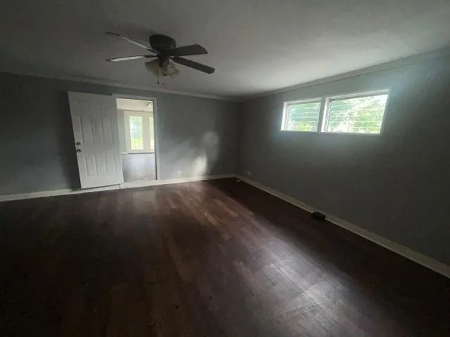 a view of room window and wooden floor