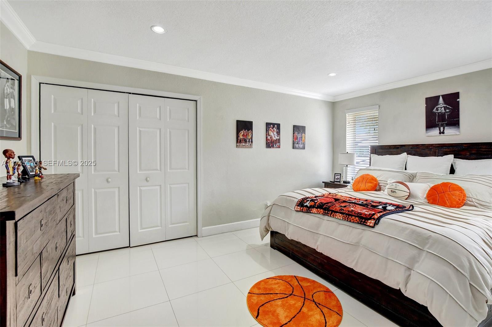 17500 Southwest 68th Court Southwest Ranches, FL 33331 - Photo 24 of 48 a bedroom with bed and window