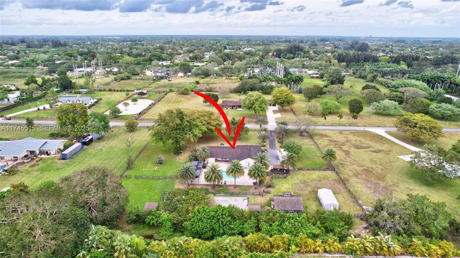 17500 Southwest 68th Court Southwest Ranches, FL 33331 - Photo 46 of 48 an aerial view of residential houses with outdoor space and trees
