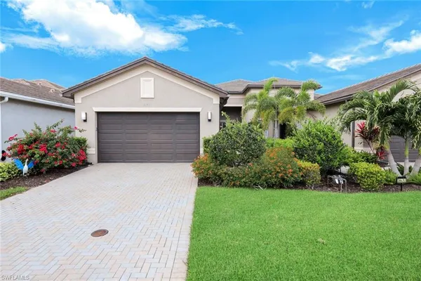 a front view of house with a yard