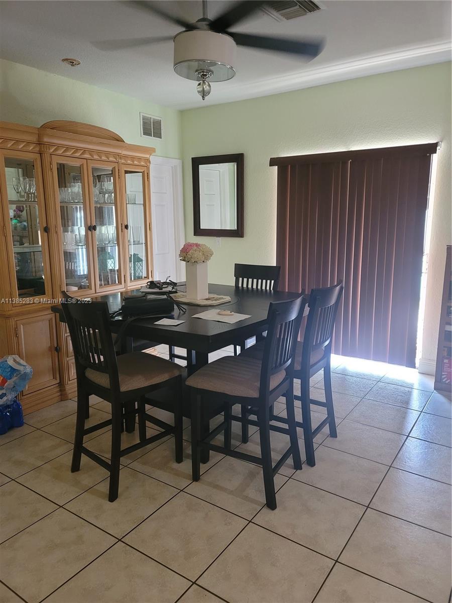 Florida City Florida City, FL 33034 - Photo 3 of 7 a view of a dining room with furniture