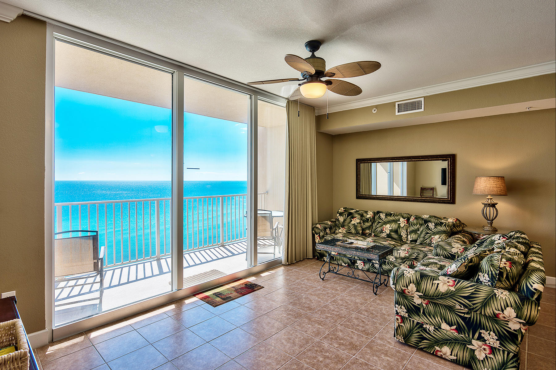 16819 Front Beach Road, Unit 1110 Panama City Beach, FL 32413 - Photo 2 of 34 a very nice looking room with a large window and a chandelier