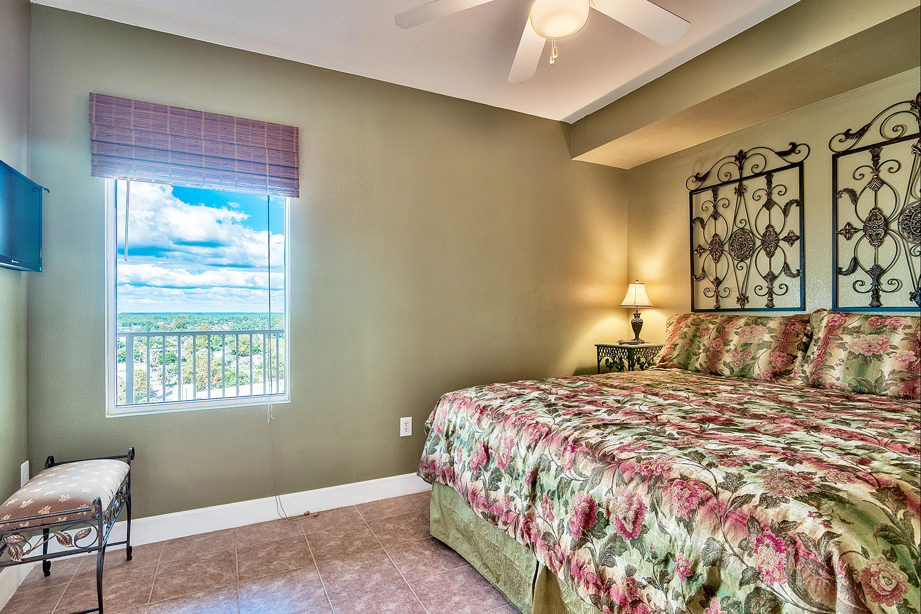 16819 Front Beach Road, Unit 1110 Panama City Beach, FL 32413 - Photo 11 of 34 a bedroom with a bed and a window