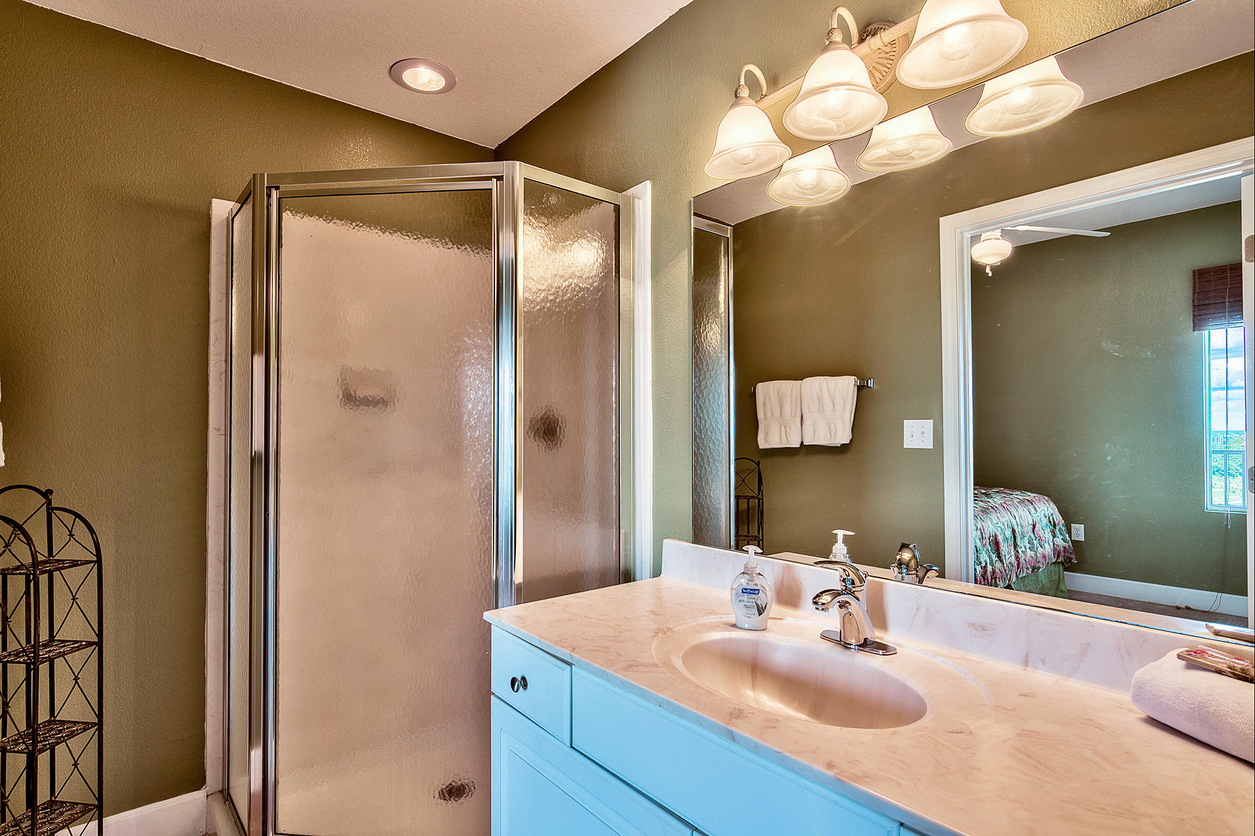 16819 Front Beach Road, Unit 1110 Panama City Beach, FL 32413 - Photo 12 of 34 a bathroom with a sink and a mirror