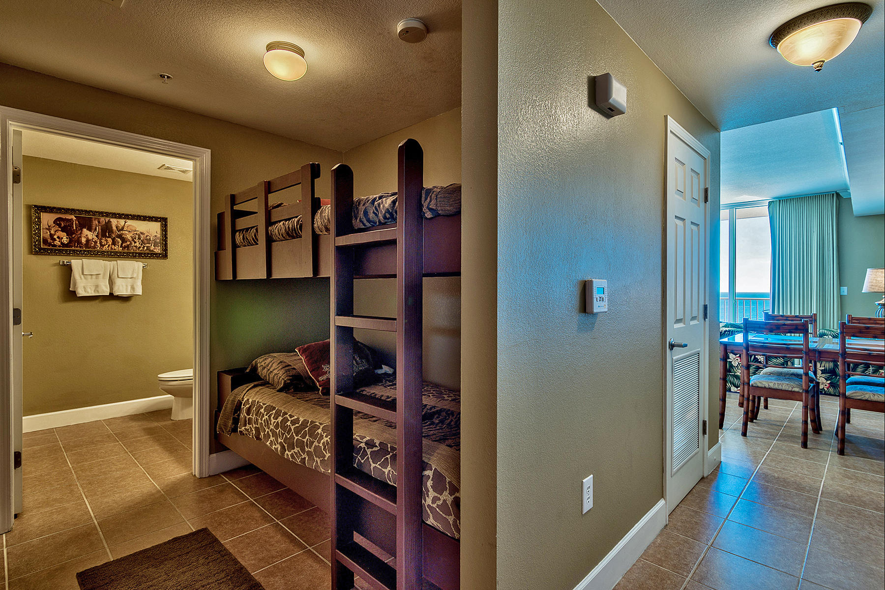 16819 Front Beach Road, Unit 1110 Panama City Beach, FL 32413 - Photo 14 of 34 a living room with furniture and a dining table