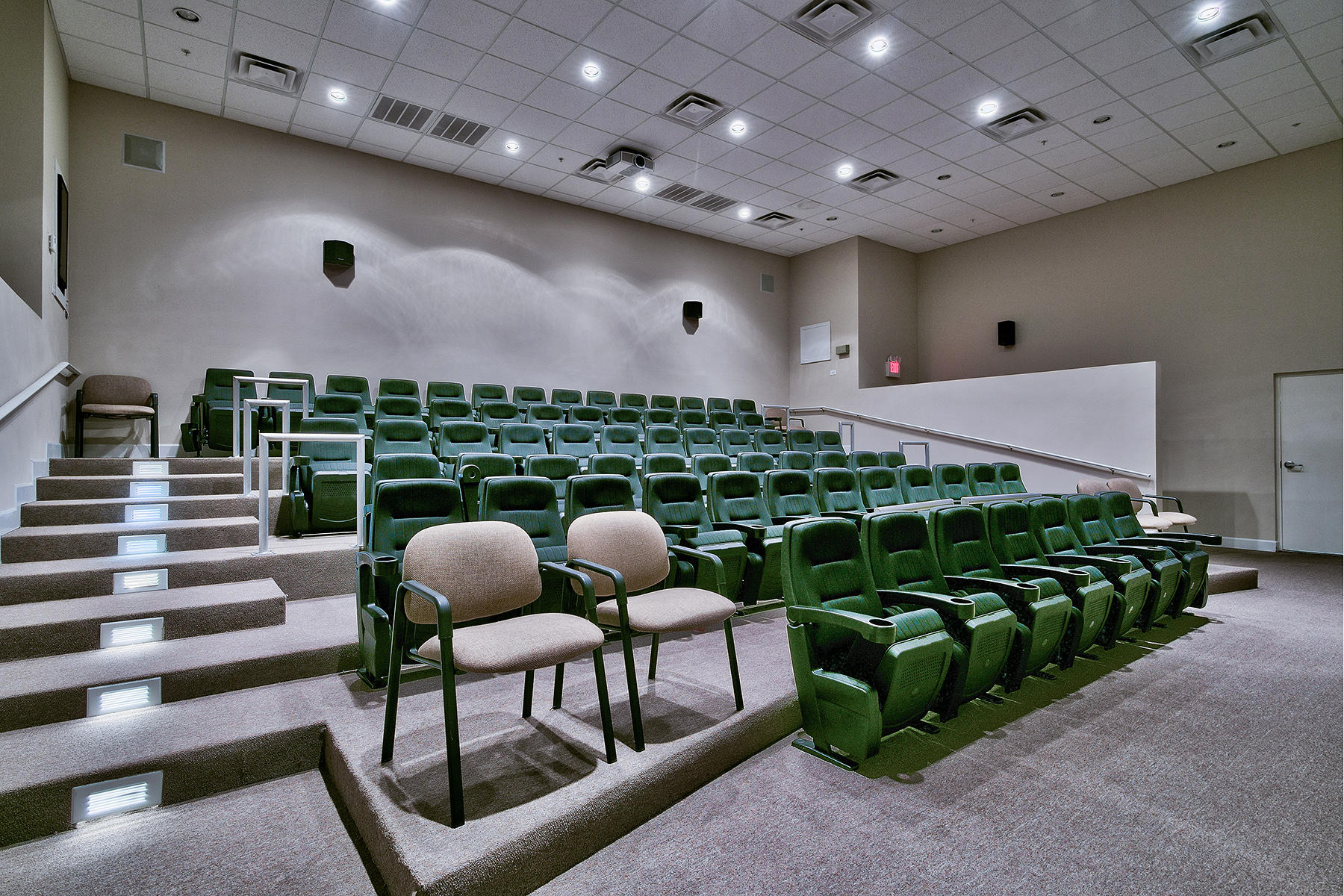 16819 Front Beach Road, Unit 1110 Panama City Beach, FL 32413 - Photo 22 of 34 a room with furniture and a projector screen