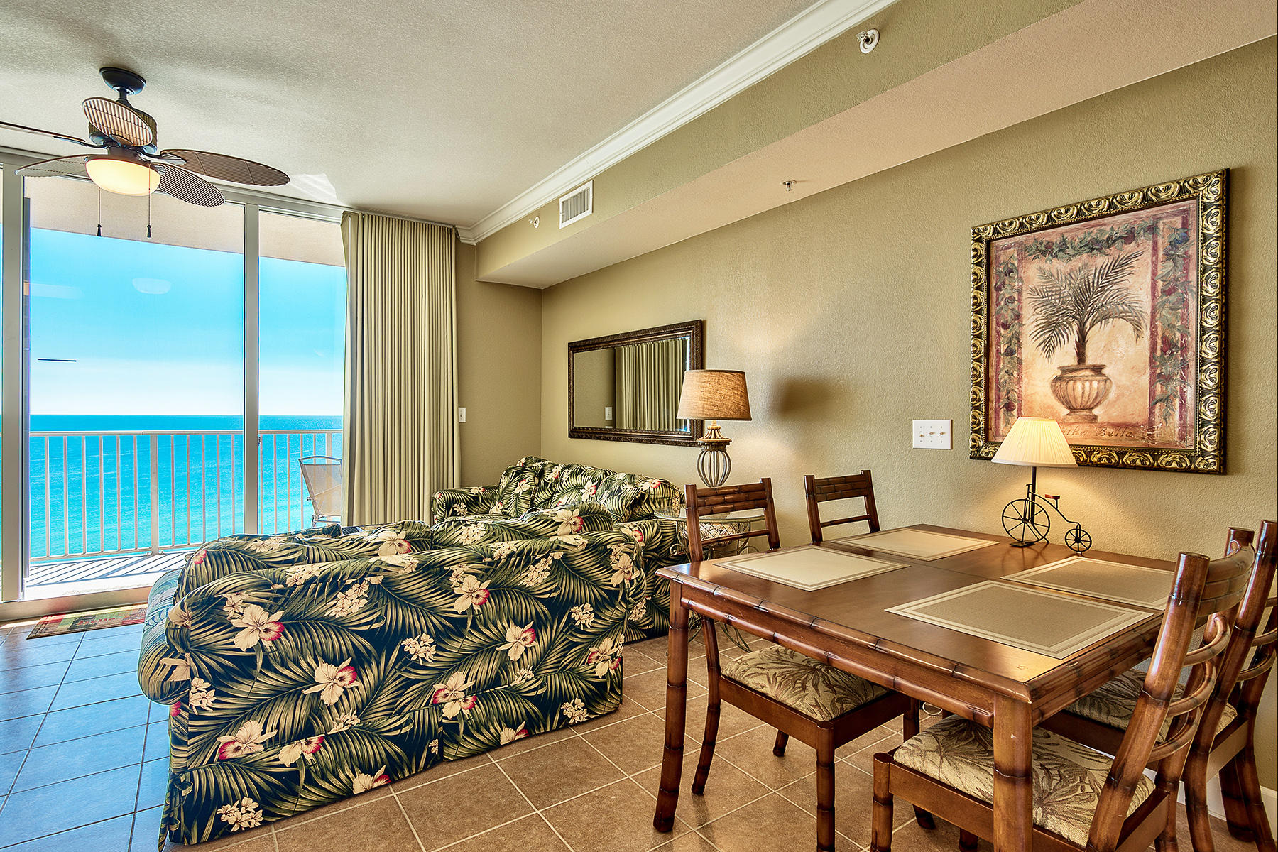 16819 Front Beach Road, Unit 1110 Panama City Beach, FL 32413 - Photo 4 of 34 a bed room with a bed and a table