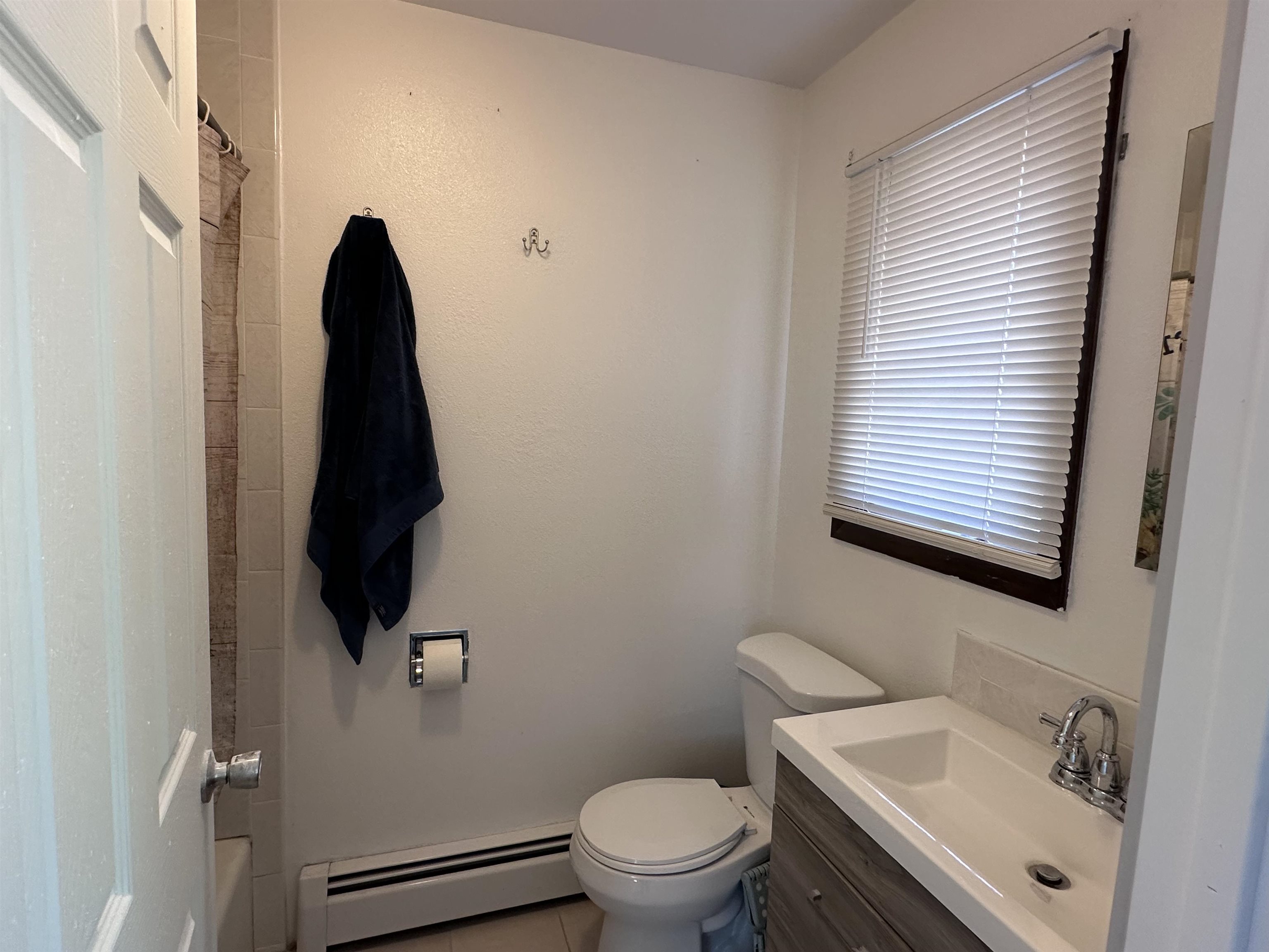 9456 6075th Road Montrose, CO 81403 - Photo 15 of 36 a bathroom with a sink and a toilet