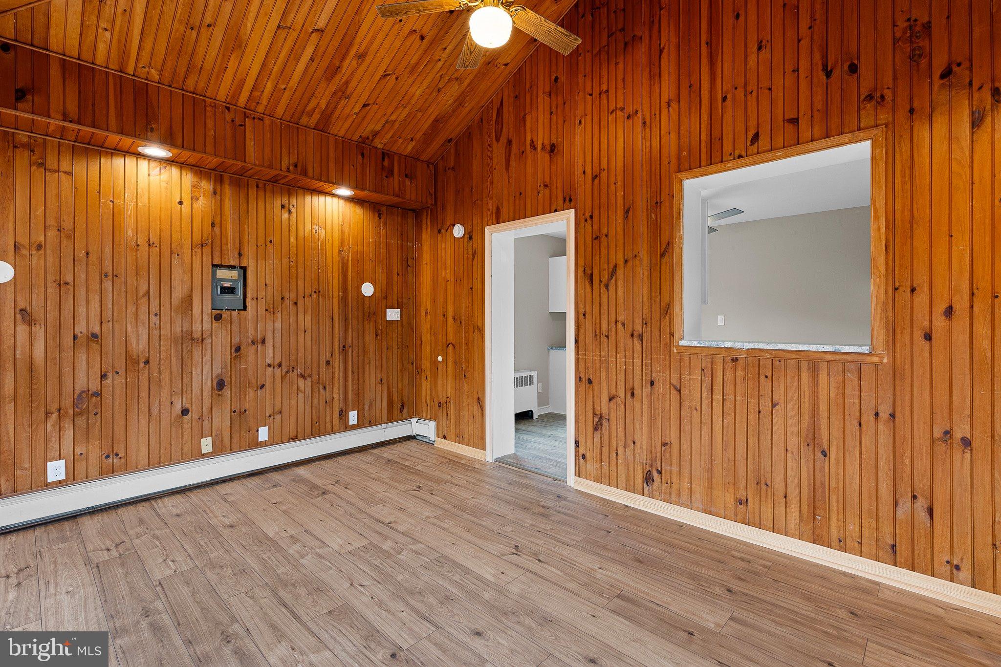 15 Irwin Avenue New Castle, DE 19720 - Photo 10 of 29 a view of an empty room with wooden floor
