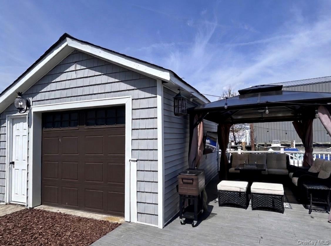 2845 Alder Road Bellmore, NY 11710 - Photo 19 of 25 one car garage with long driveway