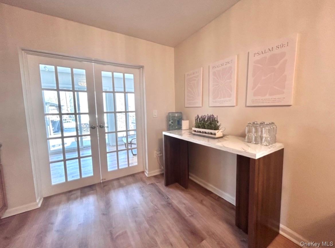 2845 Alder Road Bellmore, NY 11710 - Photo 8 of 25 French doors to dining and/or Enclosed Florida room