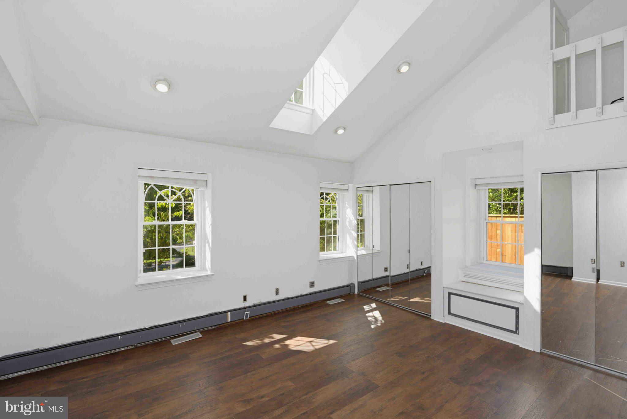 1268 Rydal Road Jenkintown, PA 19046 - Photo 30 of 34 an empty room with windows and entrance