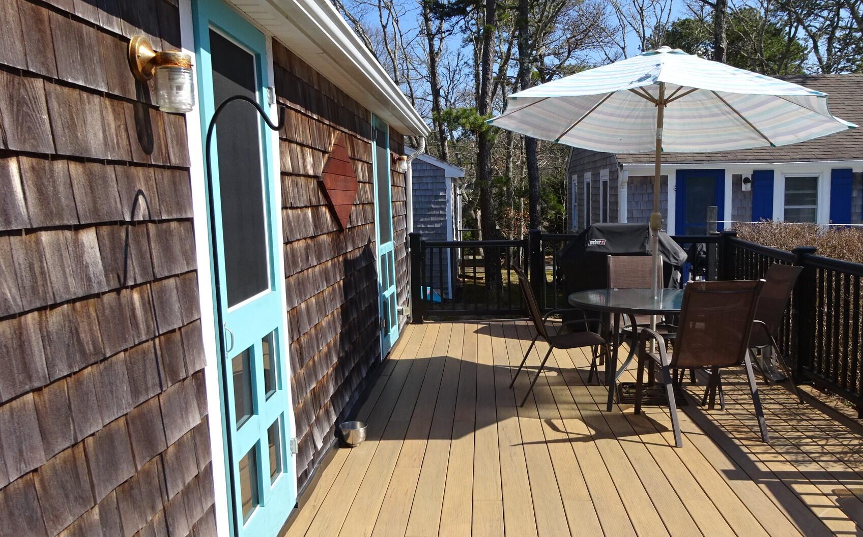 2032 State Highway Route Wellfleet, MA 02667 - Photo 1 of 33 a view of a house with barbeque oven and furniture