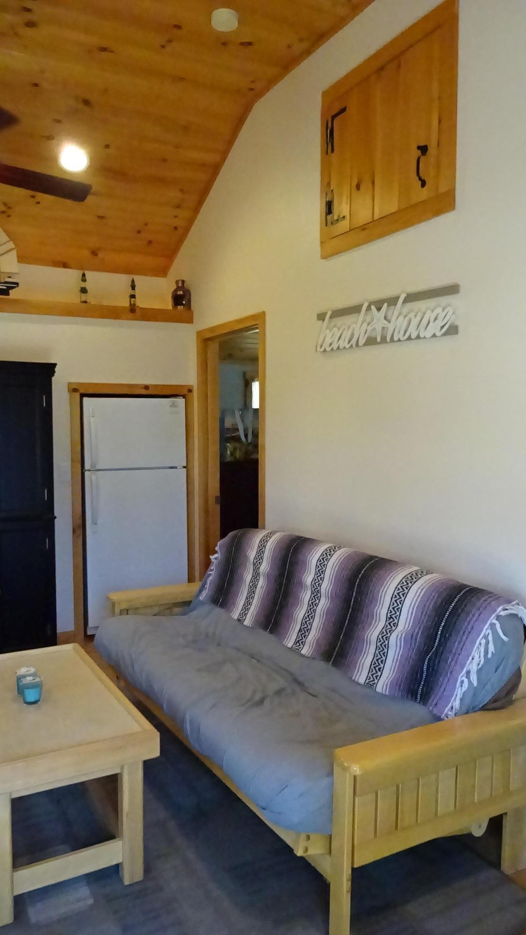 2032 State Highway Route Wellfleet, MA 02667 - Photo 12 of 33 a bedroom with a bed and a dresser