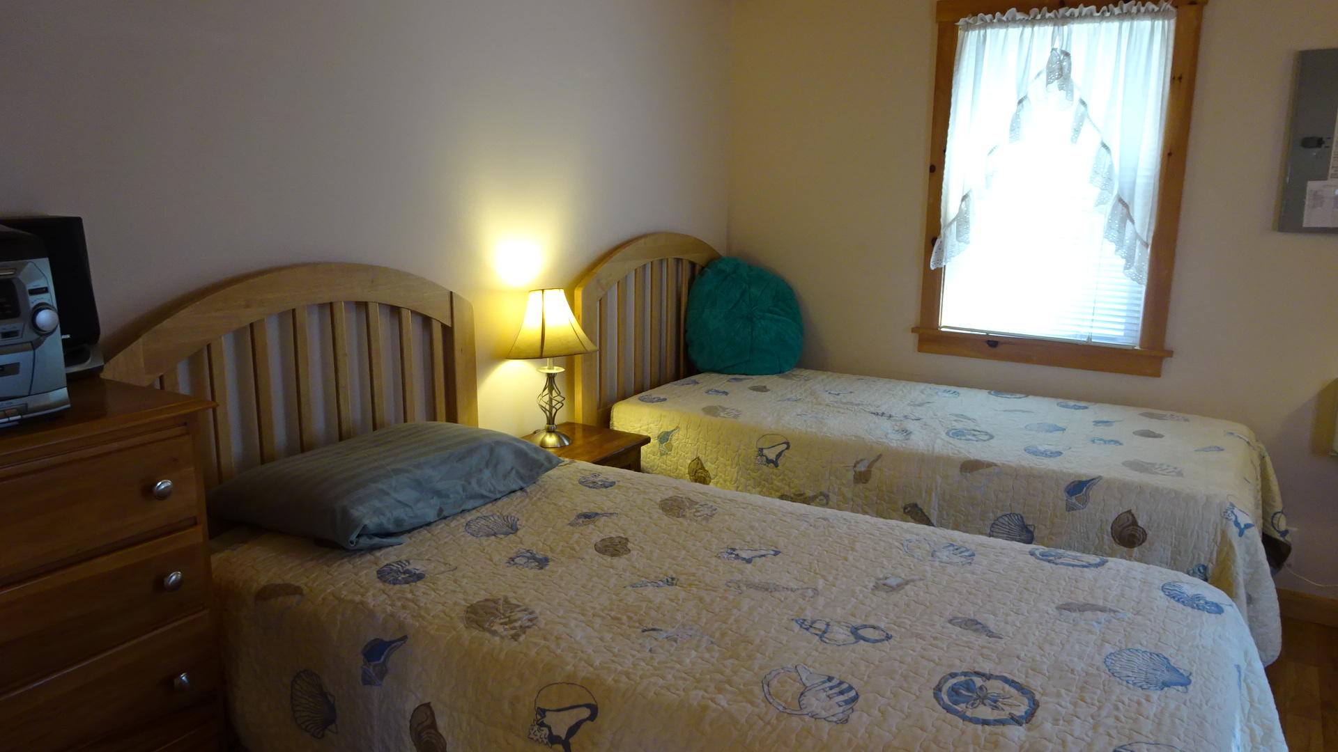 2032 State Highway Route Wellfleet, MA 02667 - Photo 15 of 33 a bedroom with two beds and a window