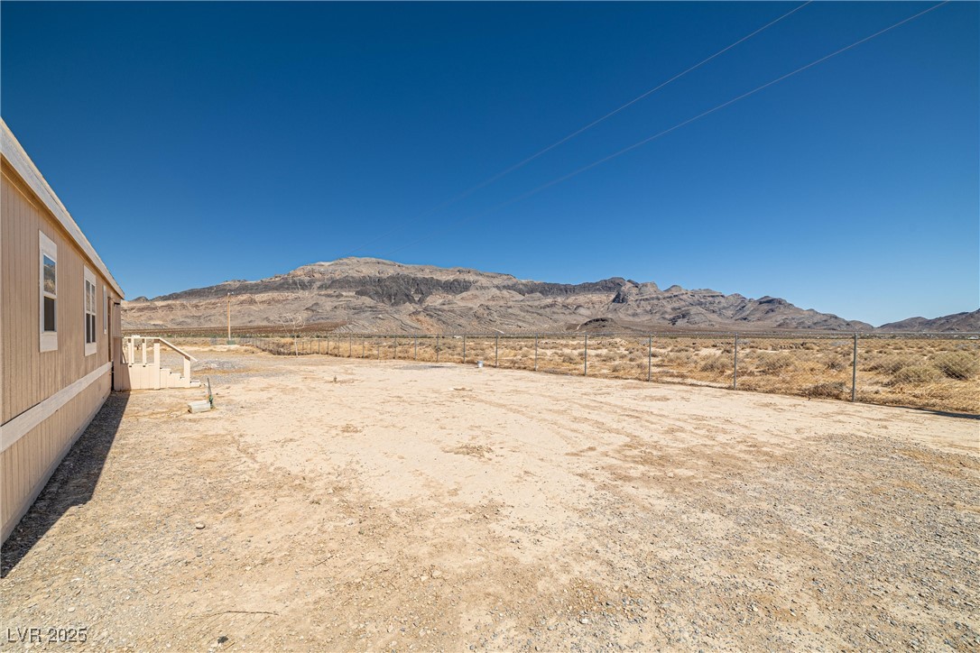2150 West Harris Farm Road Pahrump, NV 89060 - Photo 7 of 33 View of yard with a mountain view