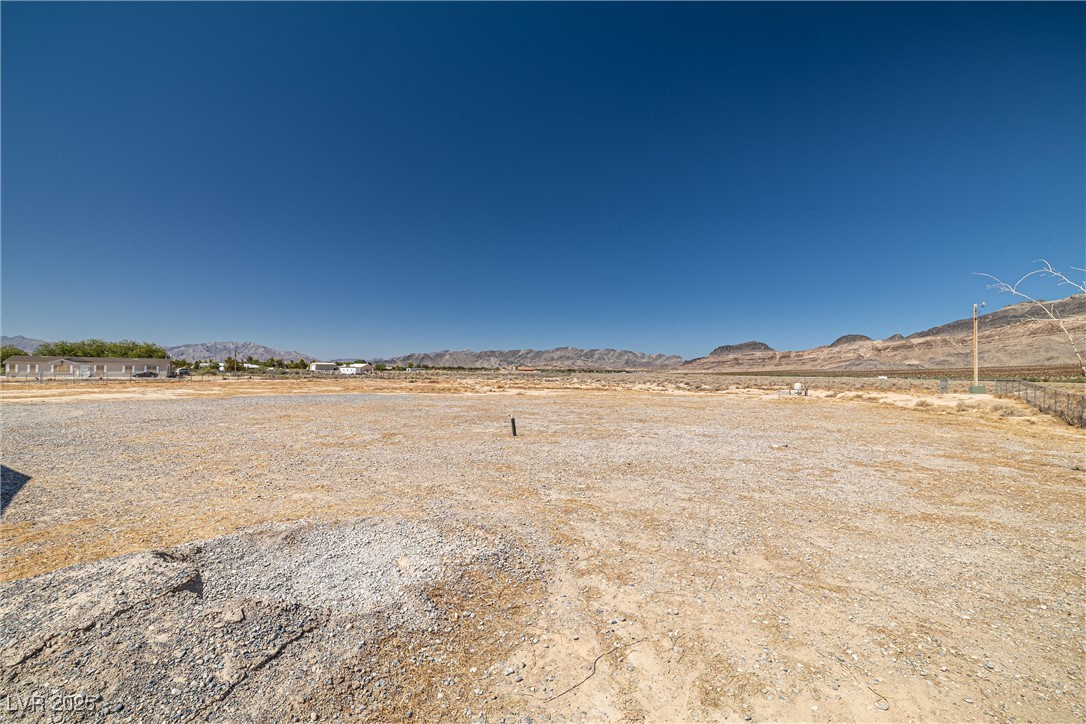 2150 West Harris Farm Road Pahrump, NV 89060 - Photo 10 of 33 View of yard with a mountain view