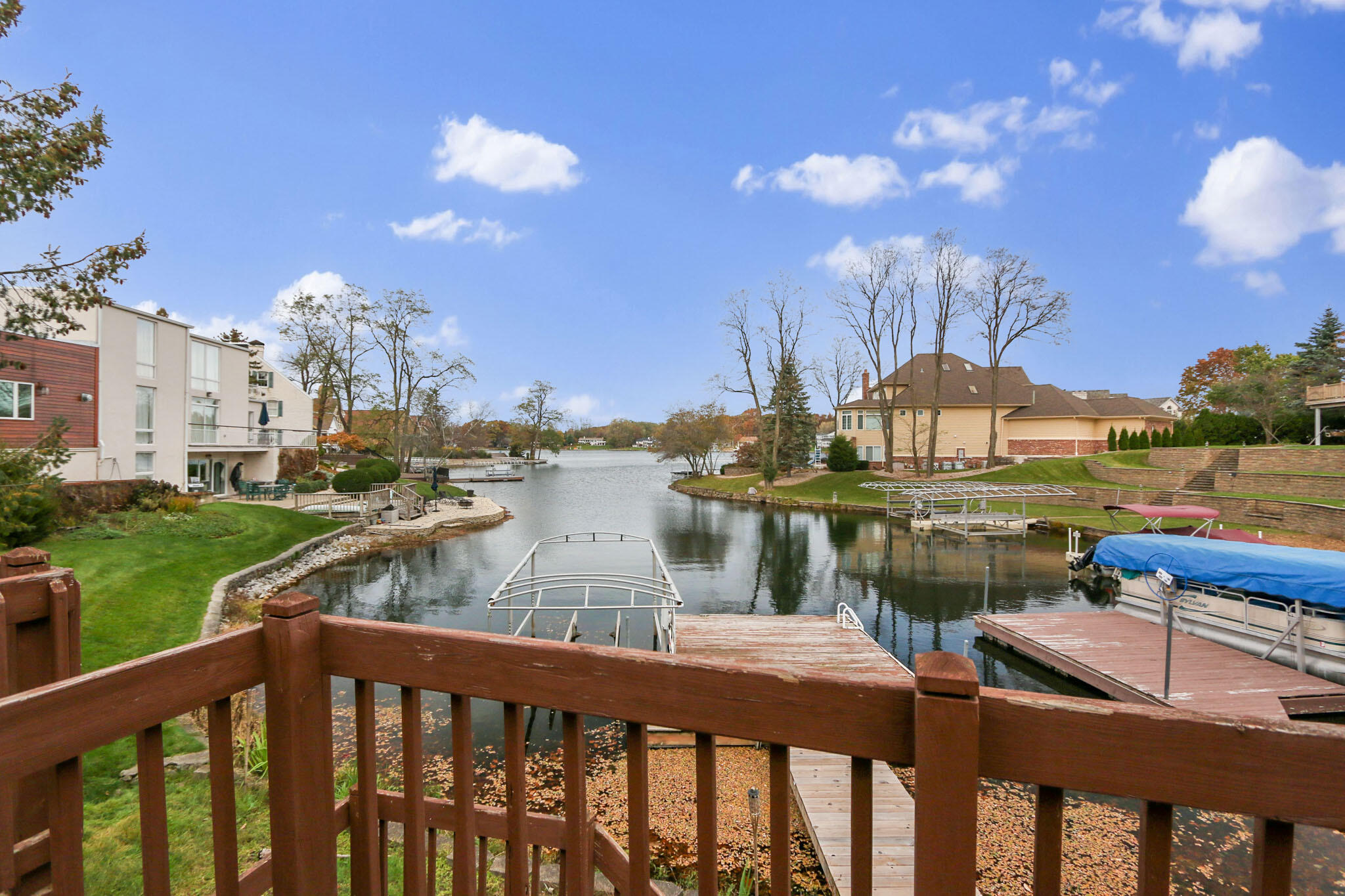 366 Devon Court Valparaiso, IN 46385 - Photo 3 of 45 a view of a lake from a balcony with outdoor seating