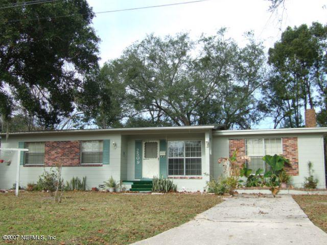 front view of a house with a patio