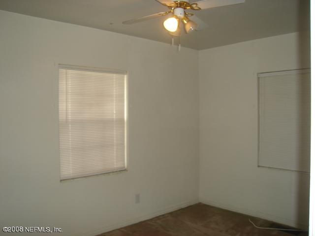 2509 Gayland Road Jacksonville, FL 32218 - Photo 4 of 8 an empty room with a window