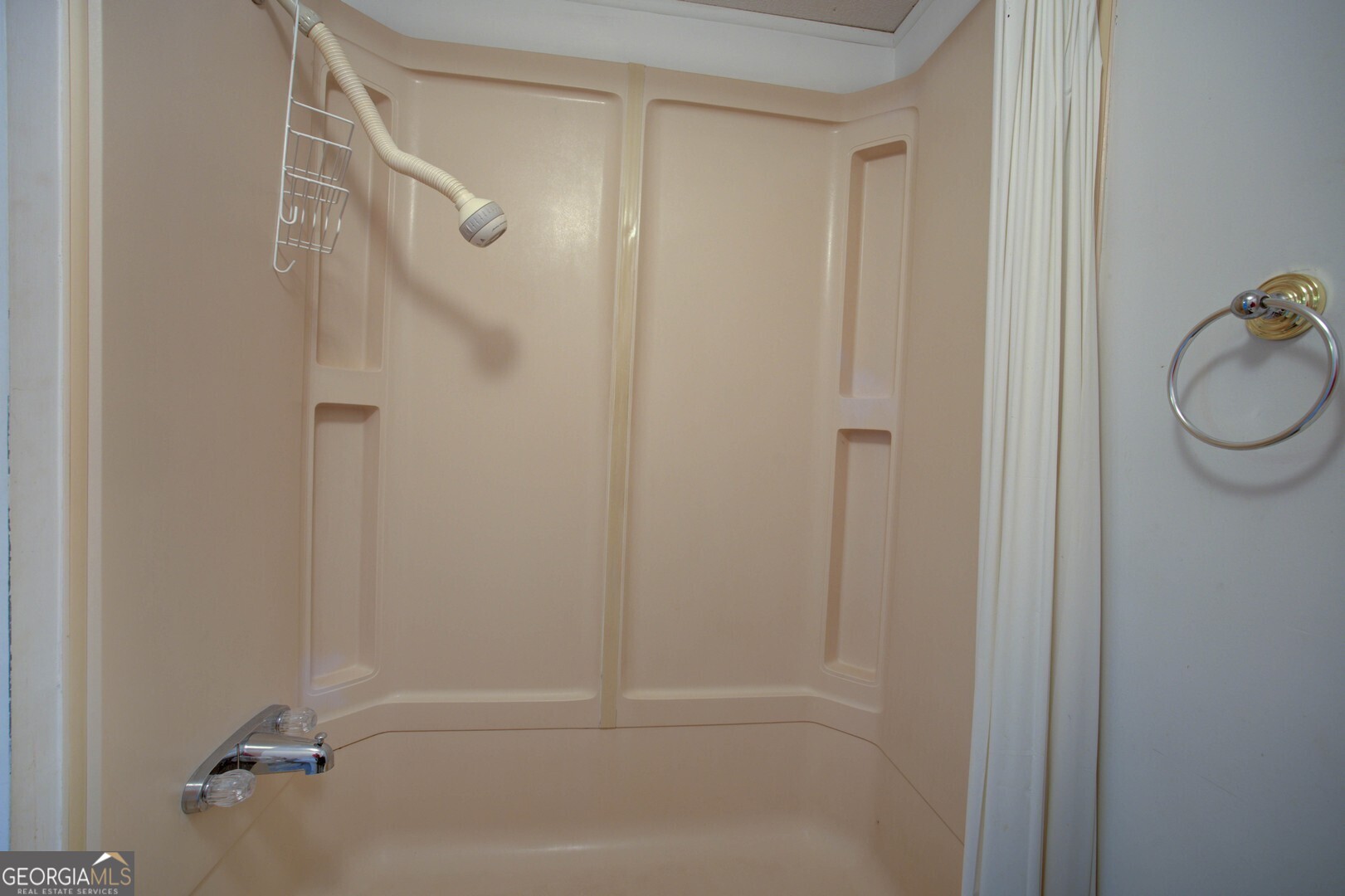 3825 North Goddard Road Lithonia, GA 30038 - Photo 23 of 36 a bathroom with a shower