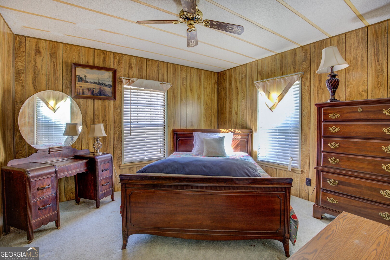 3825 North Goddard Road Lithonia, GA 30038 - Photo 25 of 36 a bedroom with a bed and a chandelier