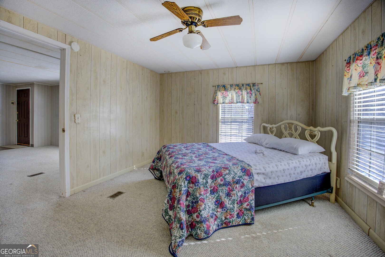 3825 North Goddard Road Lithonia, GA 30038 - Photo 30 of 36 a bedroom with a bed and window