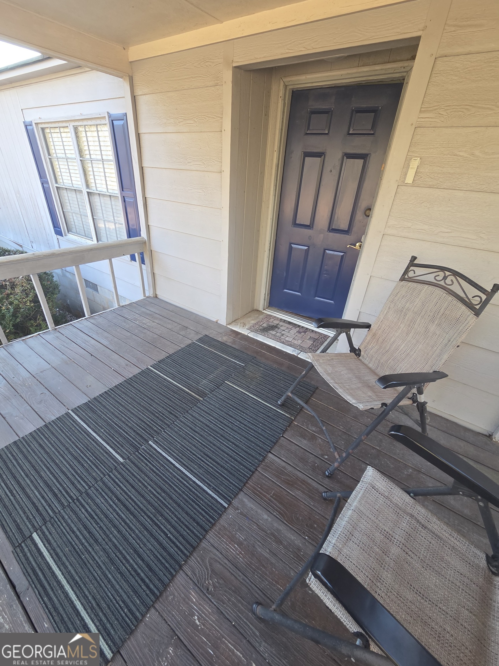 3825 North Goddard Road Lithonia, GA 30038 - Photo 35 of 36 a bedroom with a bed and a window