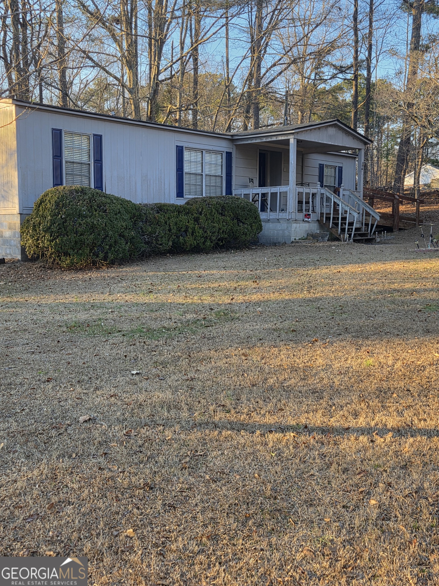 3825 North Goddard Road Lithonia, GA 30038 - Photo 36 of 36 a view of a house with a yard