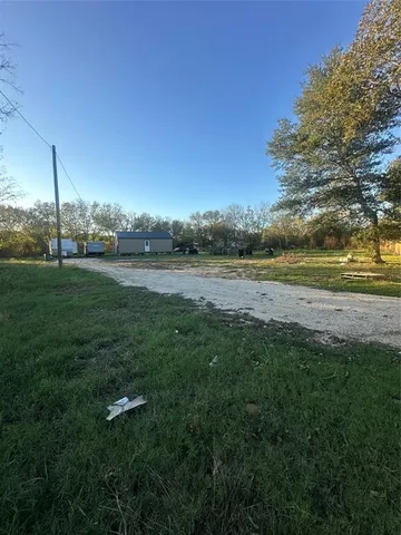 a view of yard and ocean view