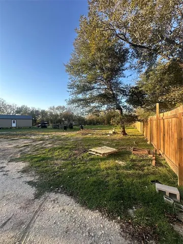 a view of a lake with a big yard