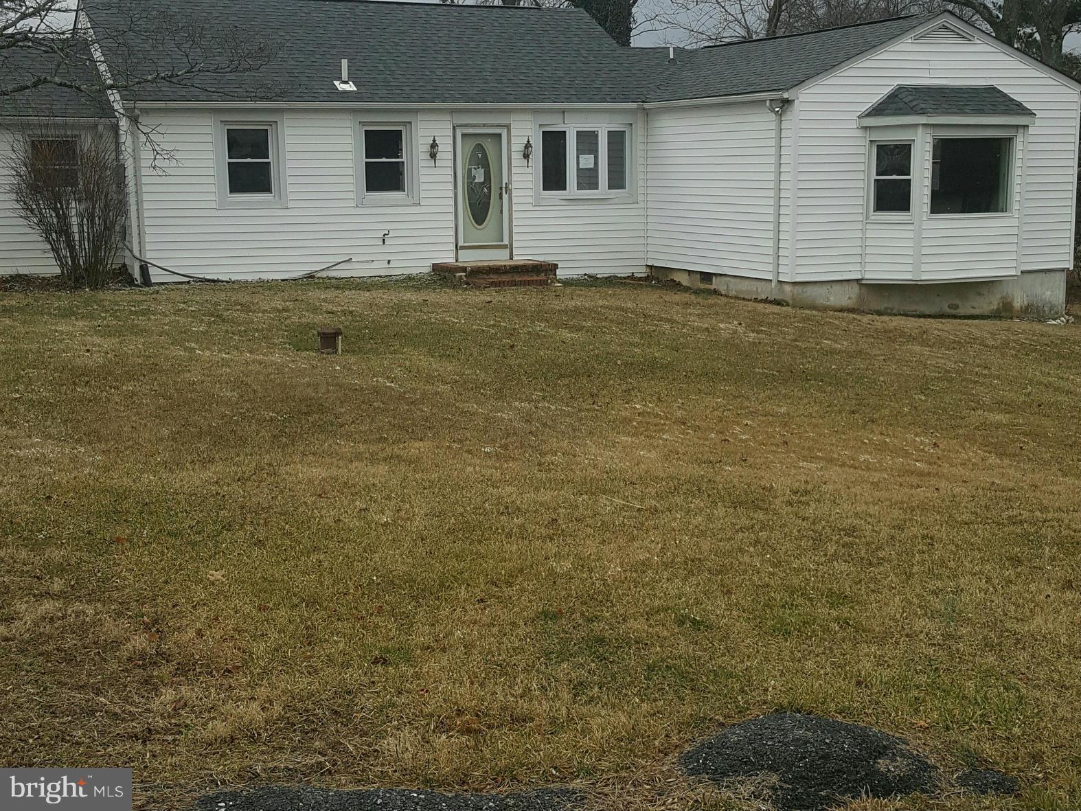 8611 Inwood Road Baltimore, MD 21244 - Photo 1 of 23 a view of a backyard of the house