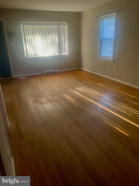 1457 Church Street Reading, PA 19601 - Photo 7 of 16 Front window in LR, wood floor
