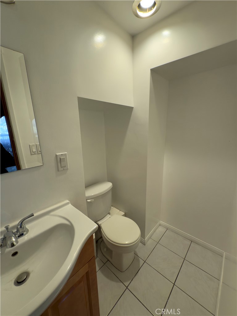 3204 Hempstead Avenue Arcadia, CA 91006 - Photo 13 of 16 a bathroom with a sink a toilet and a mirror