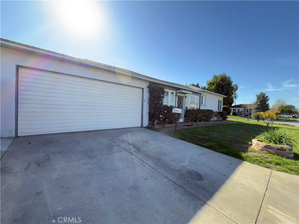 3204 Hempstead Avenue Arcadia, CA 91006 - Photo 3 of 16 a view of a house with a yard and garage