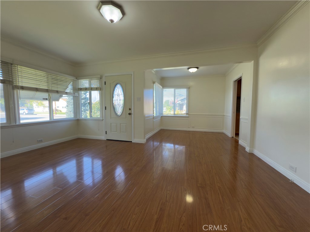3204 Hempstead Avenue Arcadia, CA 91006 - Photo 6 of 16 an empty room with wooden floor and windows