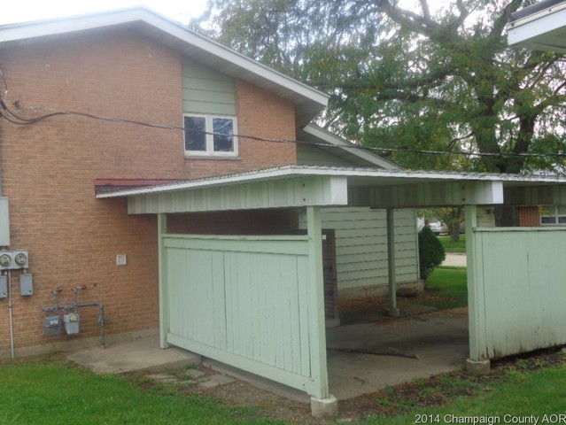 1519 Collier Avenue Rantoul, IL 61866 - Photo 7 of 15 a front view of a house with garage