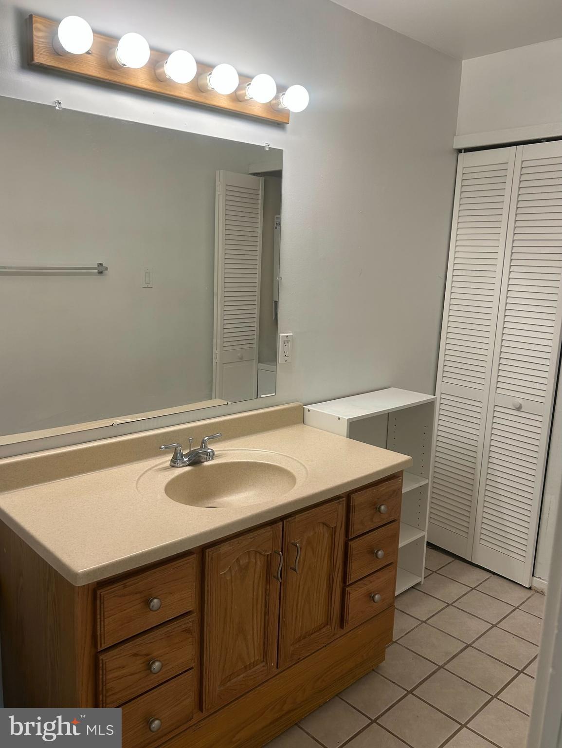 413 Gregorys Way Voorhees, NJ 08043 - Photo 4 of 11 a bathroom with a sink vanity and a mirror