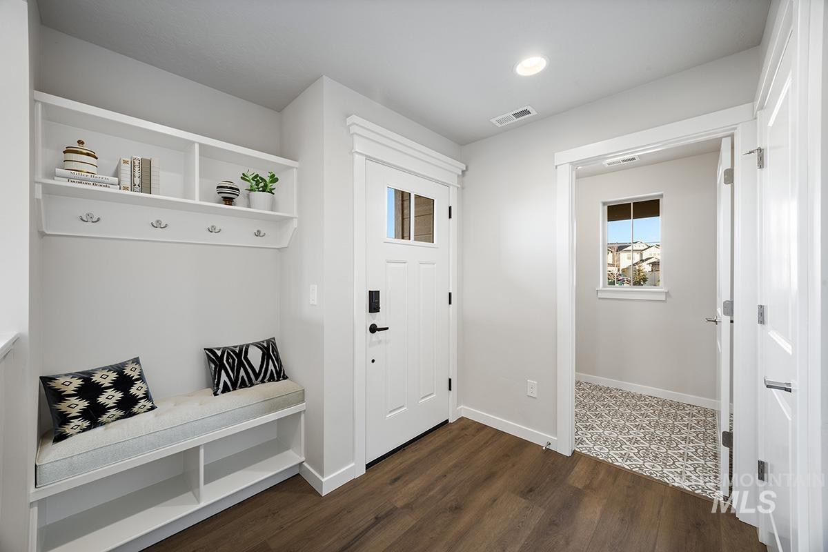 283 West Norwich Street Meridian, ID 83642 - Photo 2 of 25 Mudroom with dark wood finished floors and recessed lighting