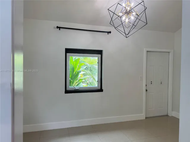 a view of a livingroom with a window
