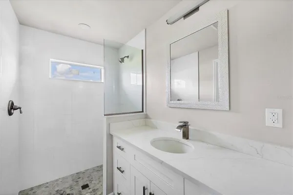 a bathroom with a sink and a toilet