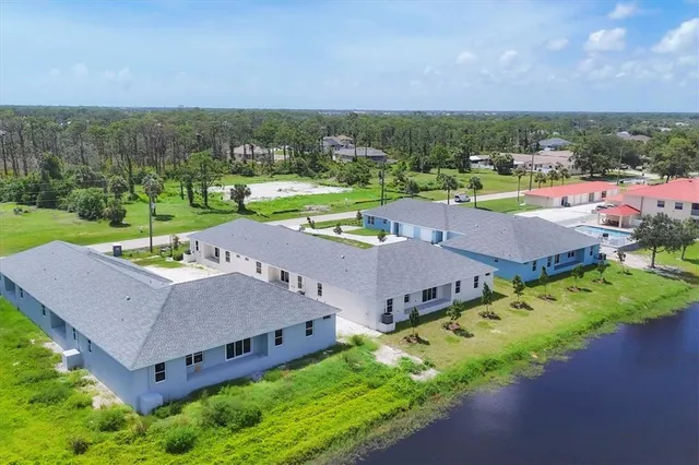 a view of a lake with a city