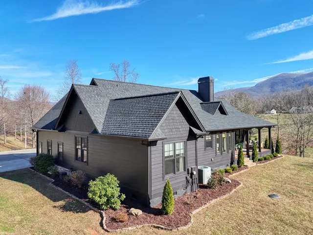 a view of a yard with swimming pool