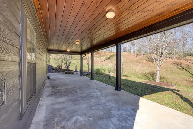 a view of a house with a rug